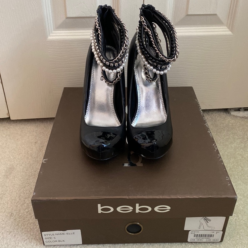 Bebe size 5 heels with chains at ankles. Never worn.